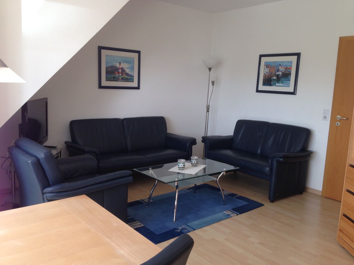 Heller Wohnbereich der Ferienwohnung Strandmuschel auf Borkum